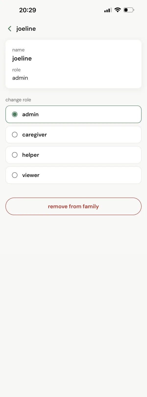 a family member's page with a role picker: admin, caregiver, helper or viewer.