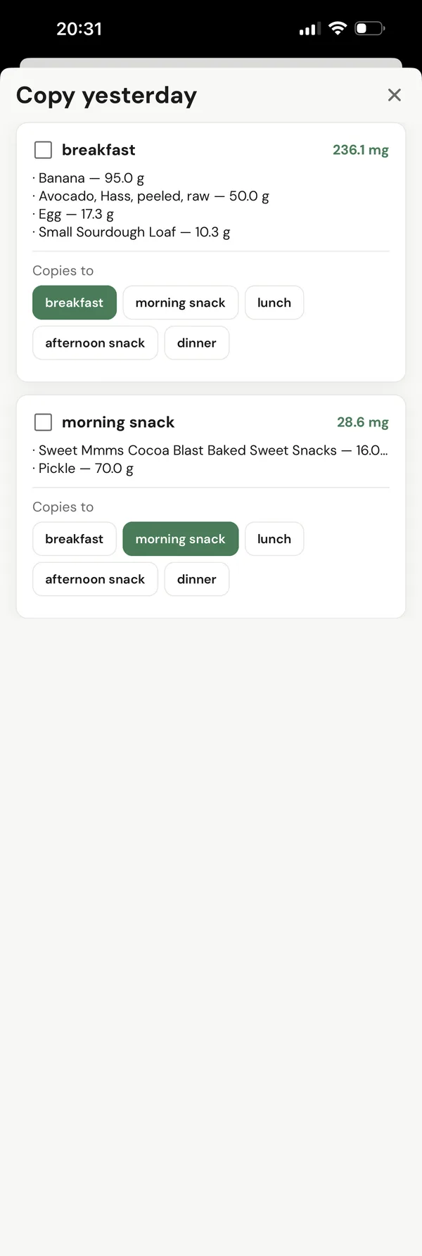 copy yesterday: breakfast at 236.1 mg and a morning snack at 28.6 mg, each with buttons for the meal slot it should copy to.